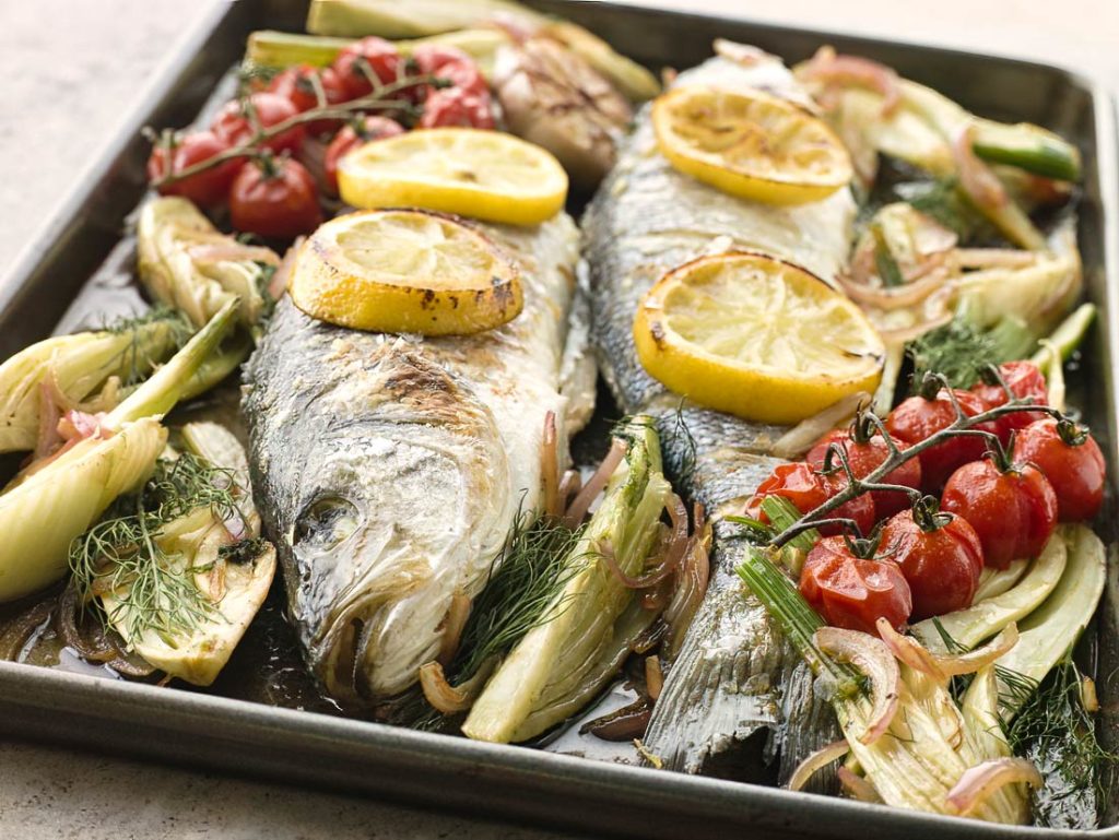 Sea Bass with Roasted Fennel, Lemon, Garlic, and Tomatoes