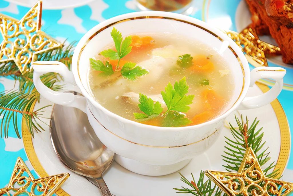 A hearty and comforting soup, traditionally served on Christmas Eve, made with carp, root vegetables, and aromatic herbs.