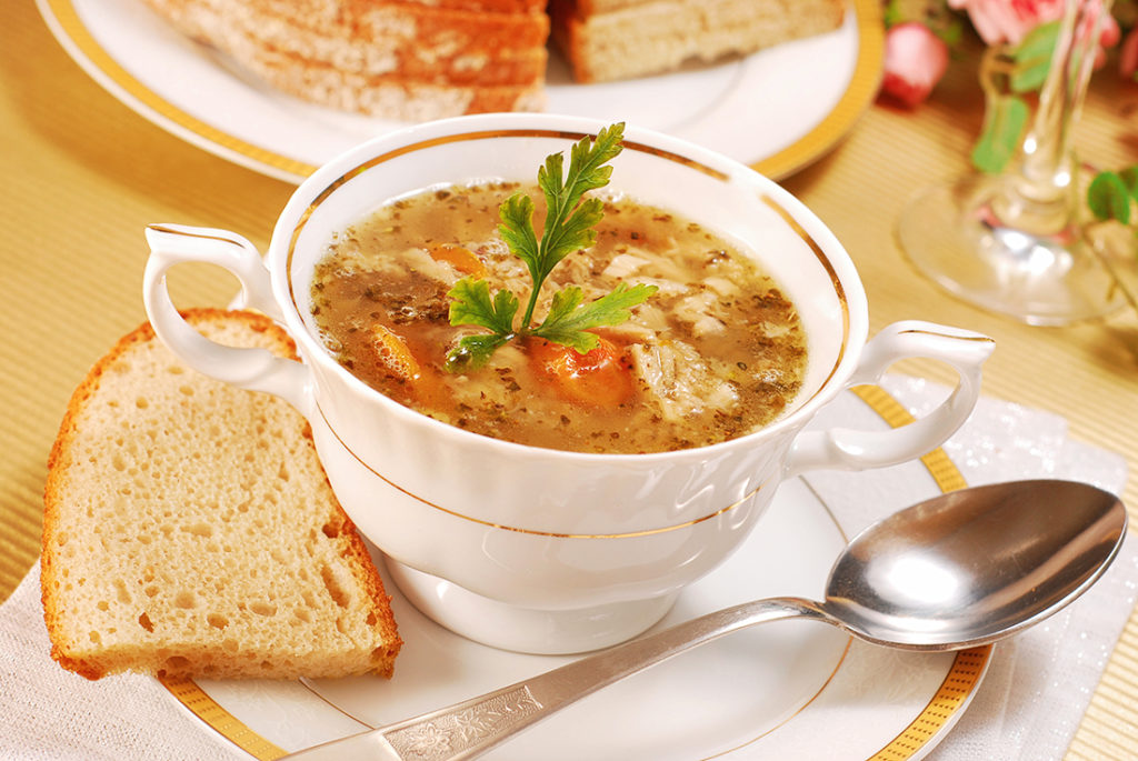 A hearty Polish soup made with tripe, vegetables, and spices, offering a warm and comforting flavor.