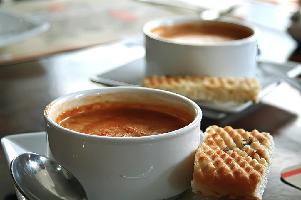 A decadent, velvety French soup made with lobster, aromatic vegetables, and cream for an unforgettable dining experience.